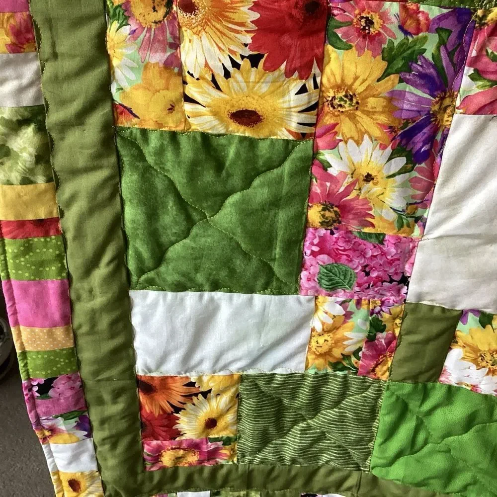 NWT. Hand Crafted Field of Flowers  Quilt with Green, Yellow and Pink Accents
